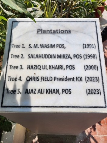 A marble plinth in the gardens of the office of the Ombudsman Sindh commemorates  President Field's visit.