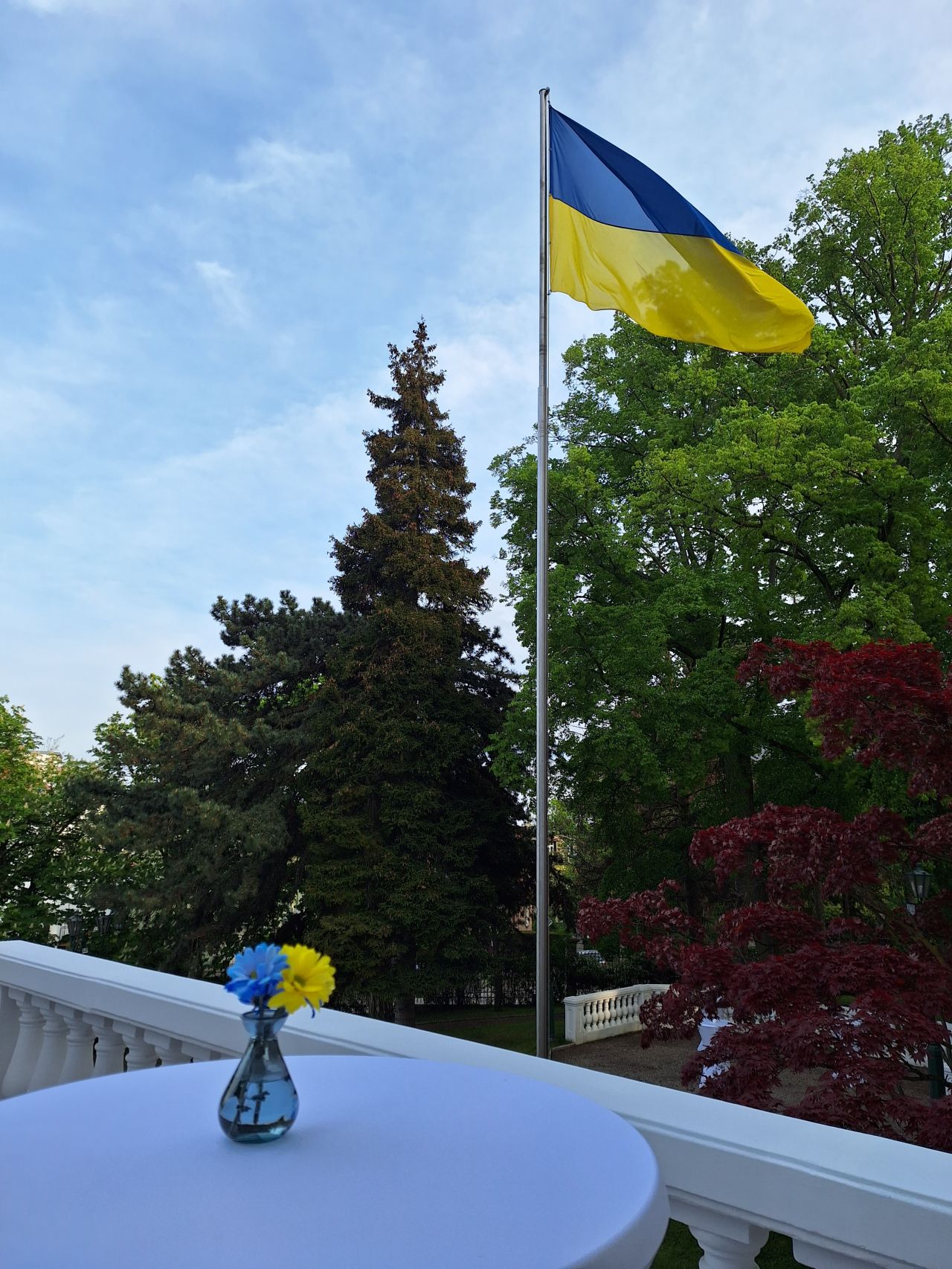 Ukrainian flag displayed at the entrance of the Ukrainian Embassy in Vienna, Austria.