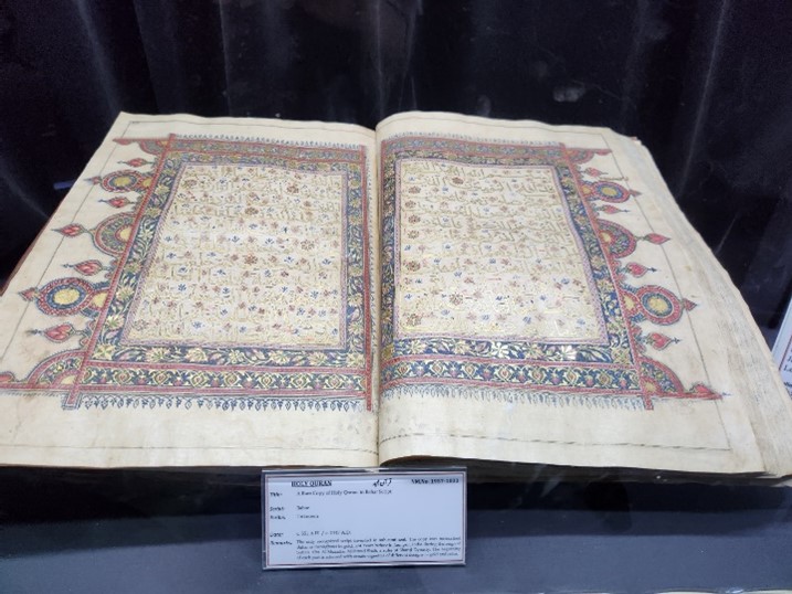 Holy Quran in Bahar Script, transcribed in gold.