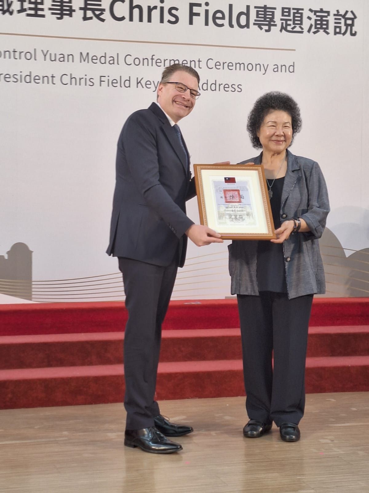 IOI President Chris Field PSM being awarded the First Grade Medal by Control Yuan President Chen Chu